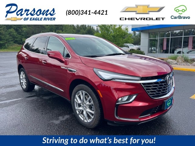 2024 Buick Enclave Essence in Cherry Red Tintcoat — front three-quarter view